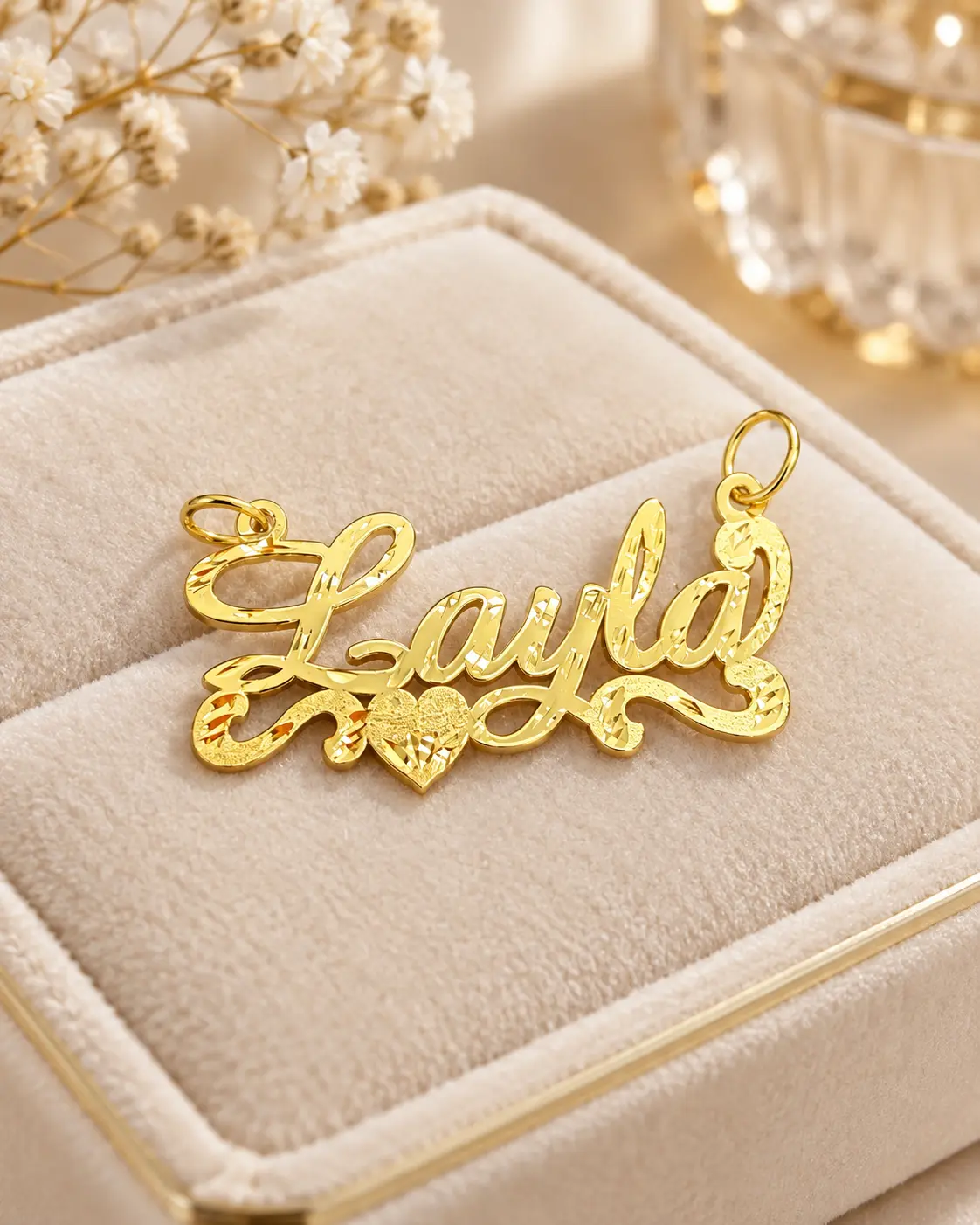Custom gold nameplate pendant with a heart